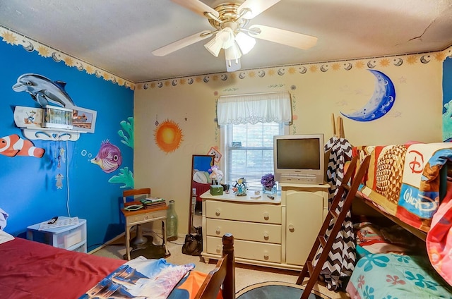 carpeted bedroom featuring ceiling fan and a textured ceiling