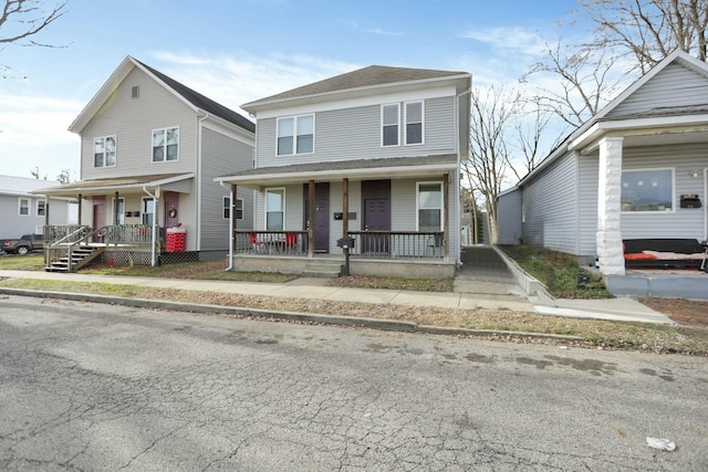 view of front of property featuring covered porch