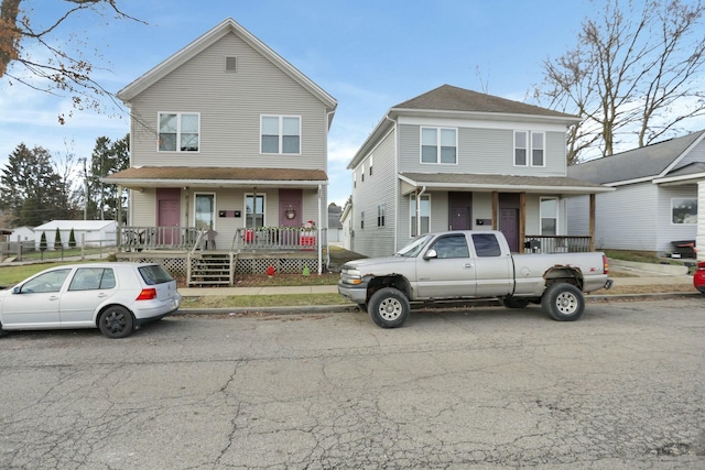 front of property featuring covered porch