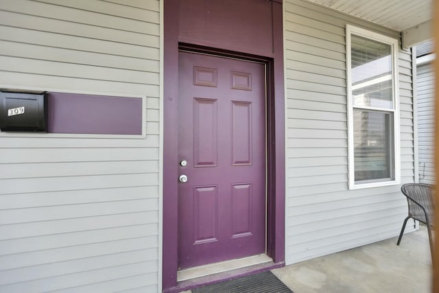 entrance to property with a porch