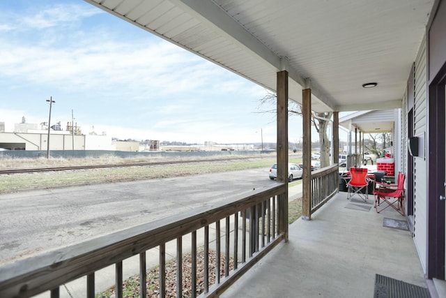 balcony featuring a porch