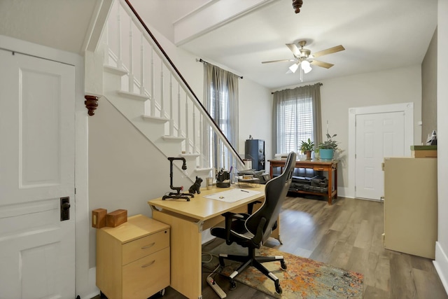 office area with ceiling fan and light wood-type flooring