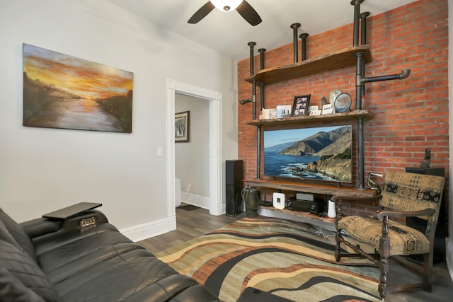 living room with dark hardwood / wood-style floors and ceiling fan