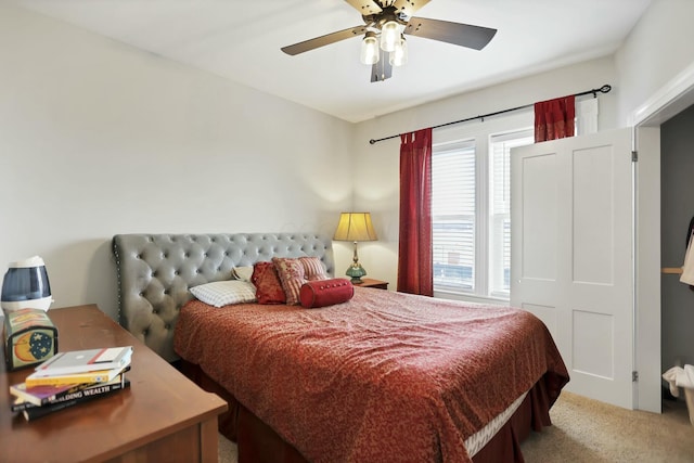 bedroom featuring ceiling fan and carpet floors