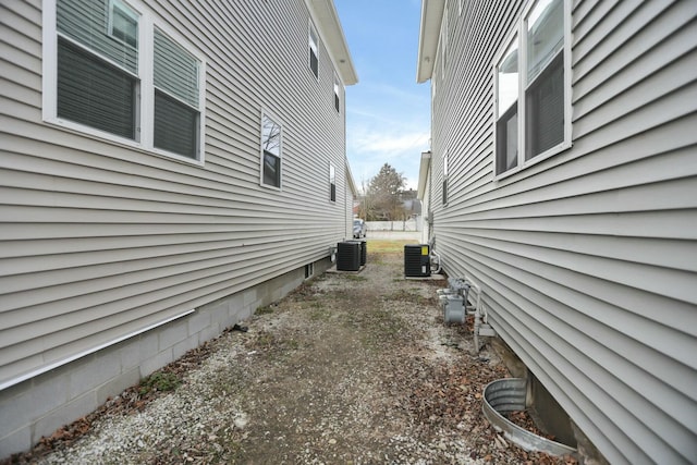 view of property exterior with central AC unit