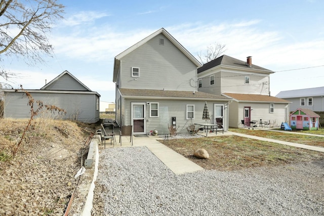 rear view of property with a patio