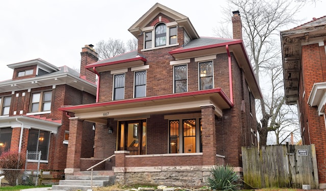 view of front of home featuring covered porch