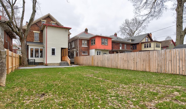 view of yard with central AC