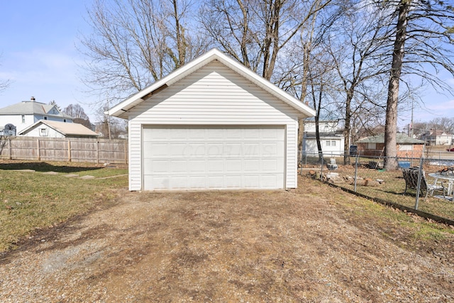 detached garage with fence