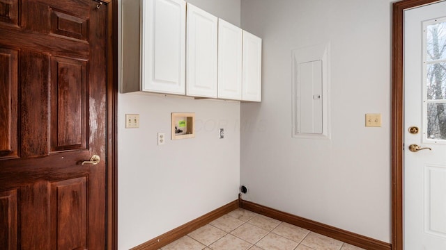 laundry area featuring washer hookup, cabinets, light tile patterned floors, and electric panel