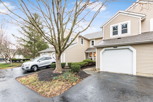 front of property featuring a garage