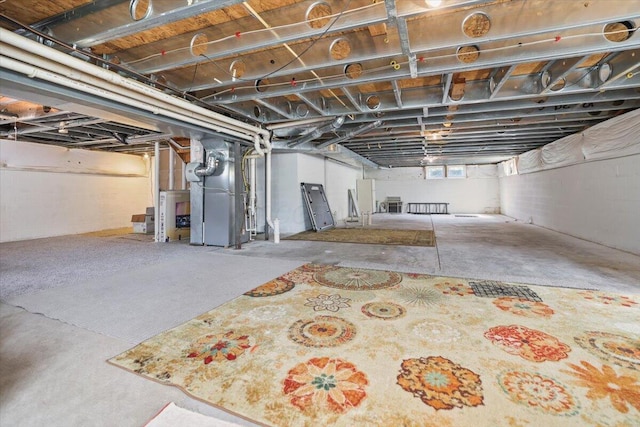 basement featuring heating unit