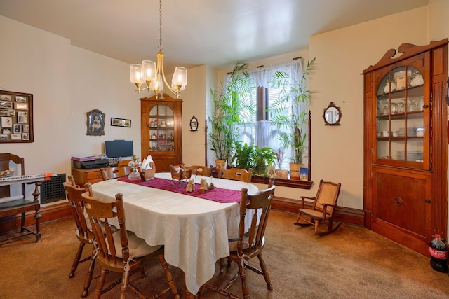 carpeted dining area featuring an inviting chandelier