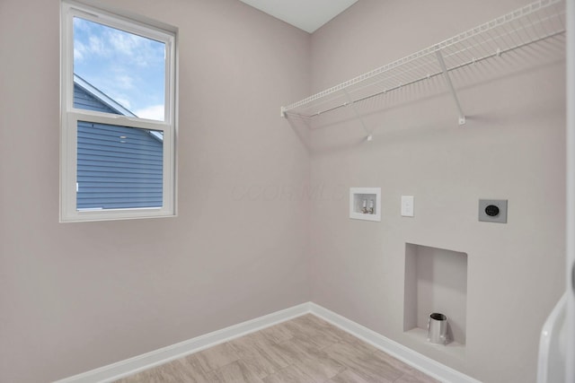 laundry room with washer hookup and hookup for an electric dryer