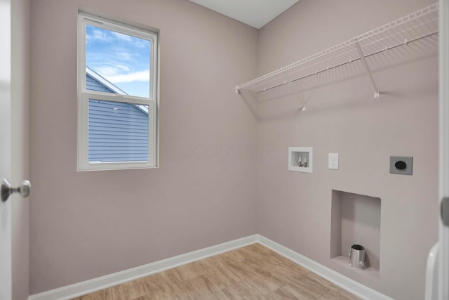 laundry area with washer hookup and hookup for an electric dryer