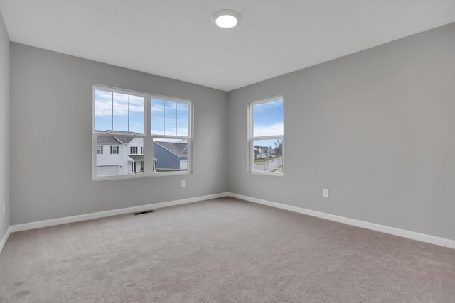 view of carpeted spare room