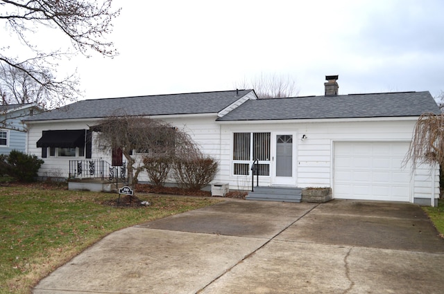 single story home featuring a garage