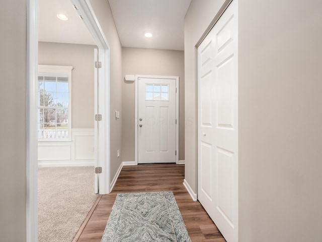 doorway to outside featuring dark hardwood / wood-style flooring