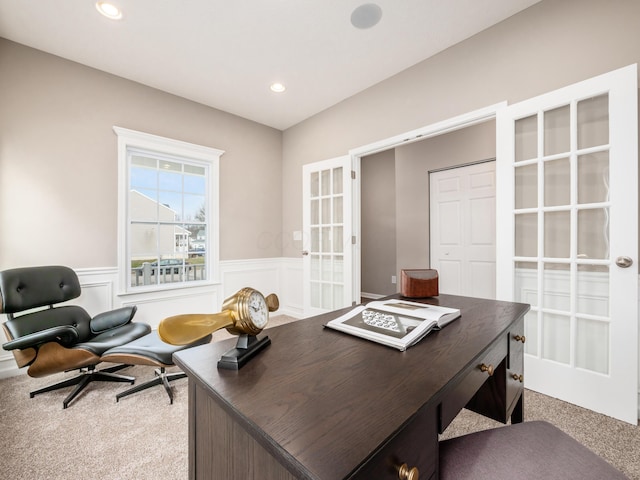 carpeted office space with french doors