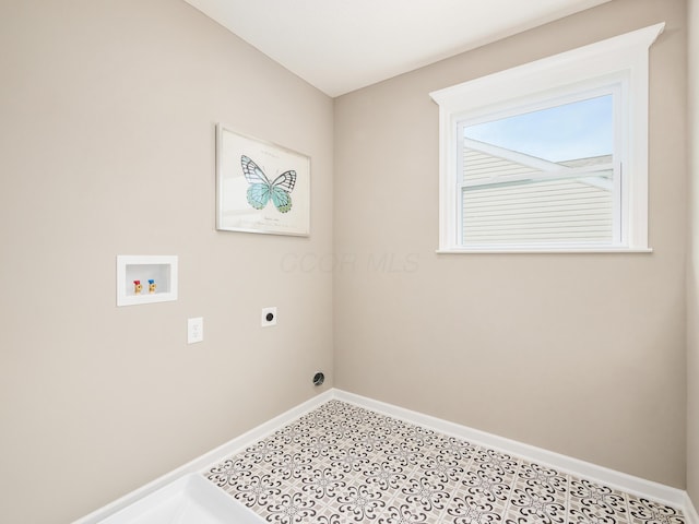 clothes washing area with washer hookup and electric dryer hookup