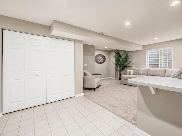 living room featuring light colored carpet