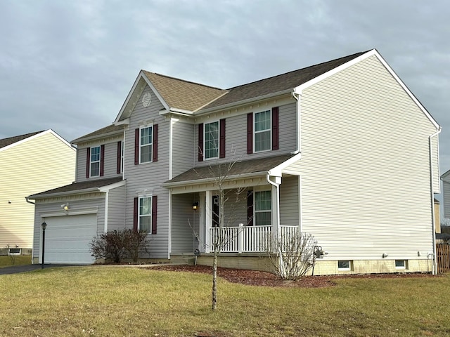 view of front of property with covered porch, a front yard, and a garage