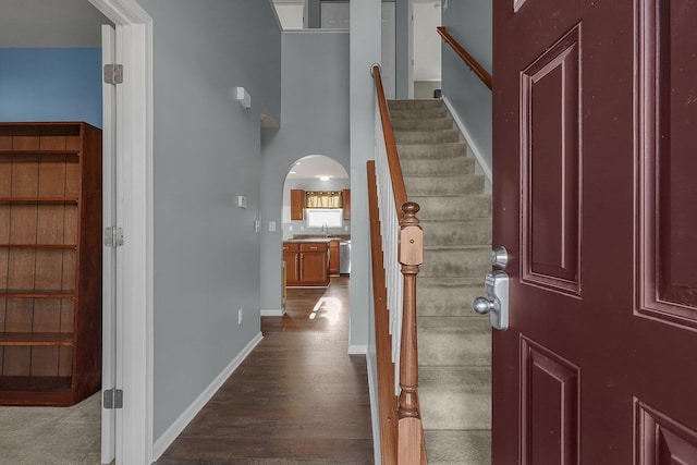 foyer featuring dark hardwood / wood-style flooring and sink