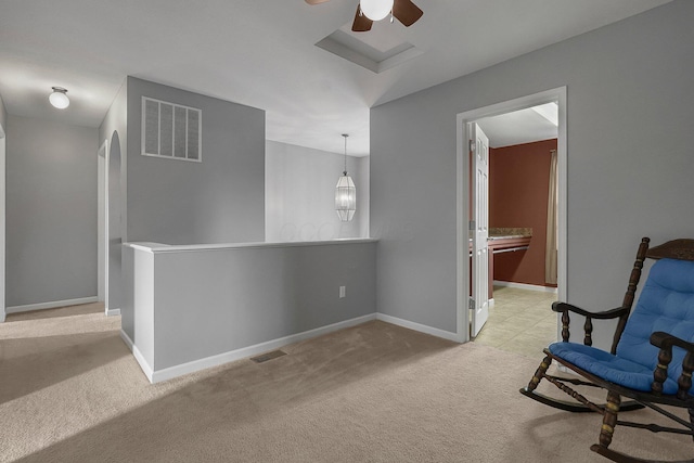 unfurnished room with light colored carpet