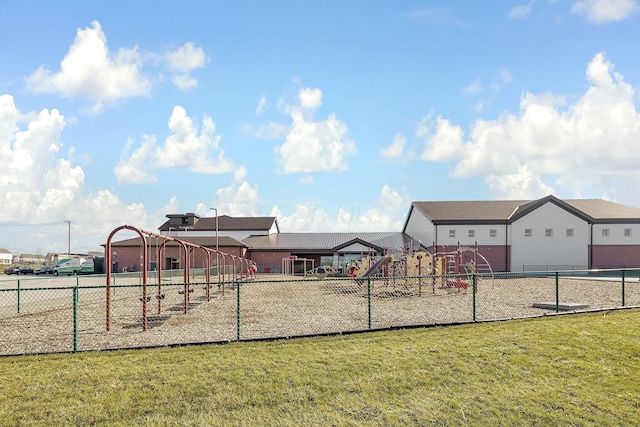 view of playground with a yard