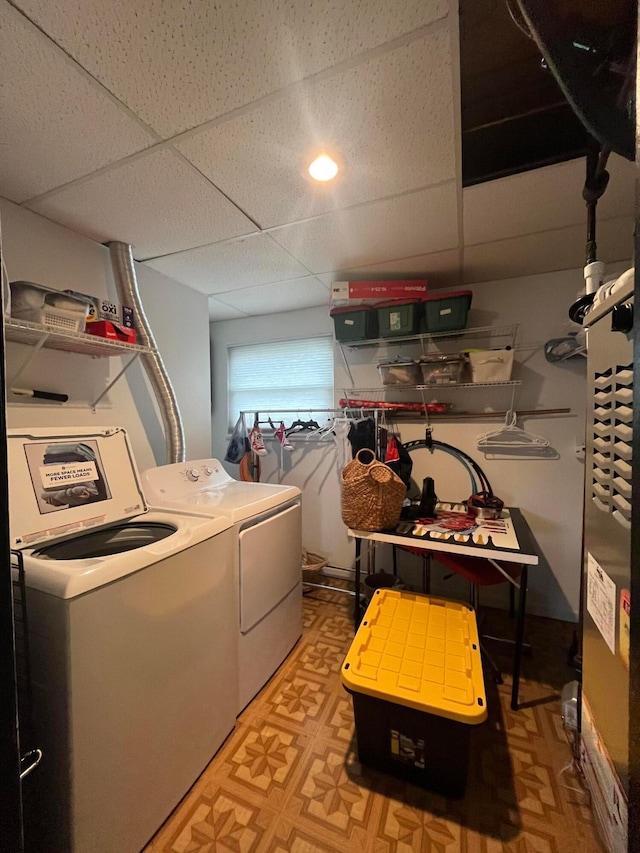 washroom with independent washer and dryer