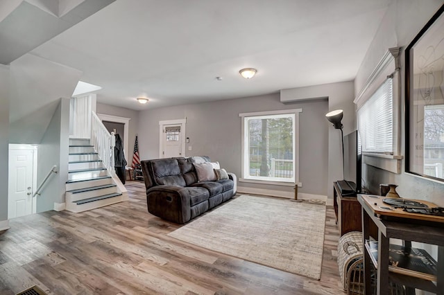 living room featuring light wood-type flooring