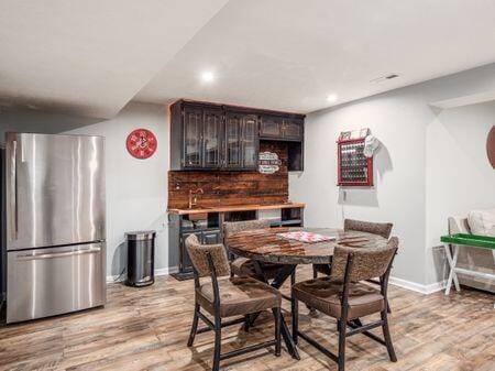 dining room with light wood-type flooring