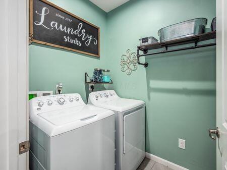 washroom with separate washer and dryer