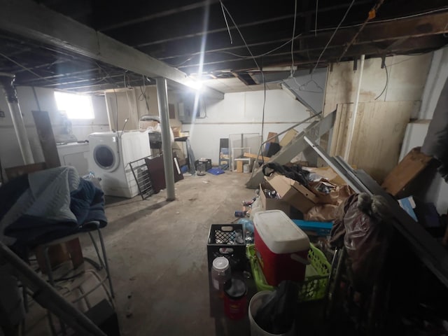 basement featuring washing machine and clothes dryer