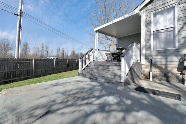 view of patio with a wooden deck