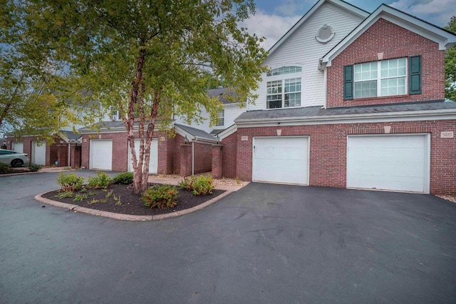 view of property featuring a garage