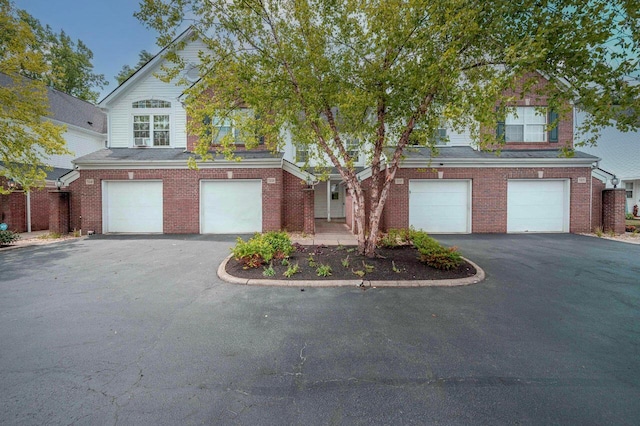 front facade with a garage