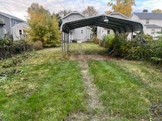 view of yard featuring a carport