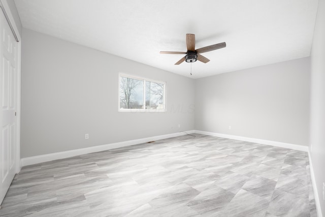 empty room featuring ceiling fan