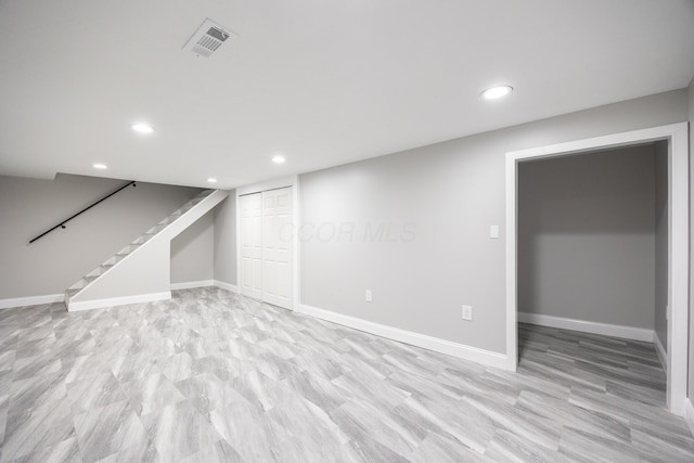 basement with light wood-type flooring