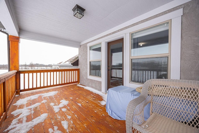 view of snow covered deck