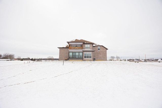 view of snow covered property