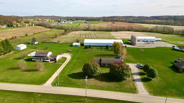 birds eye view of property featuring a rural view