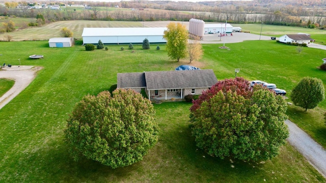 birds eye view of property featuring a rural view