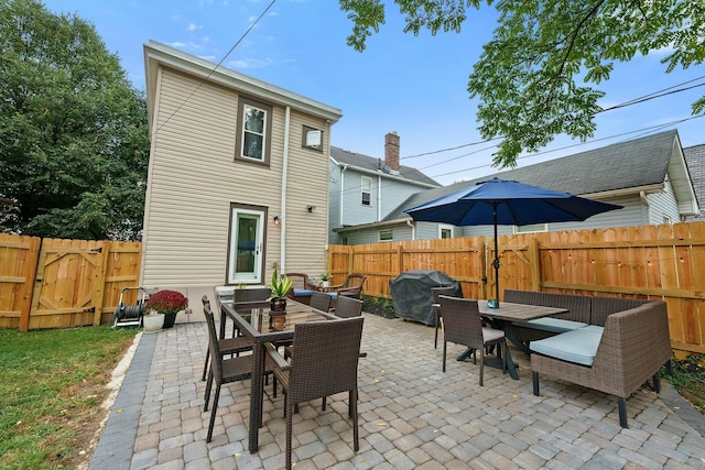 back of house with a patio area