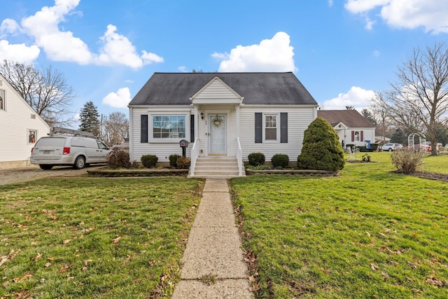 view of front of property with a front lawn