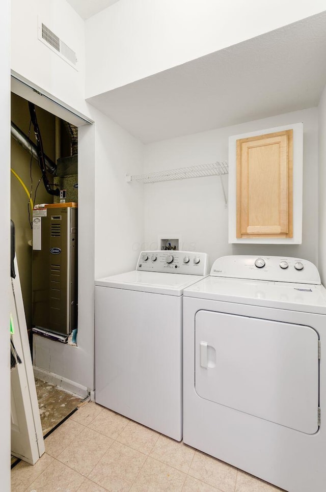 laundry room with washer and clothes dryer