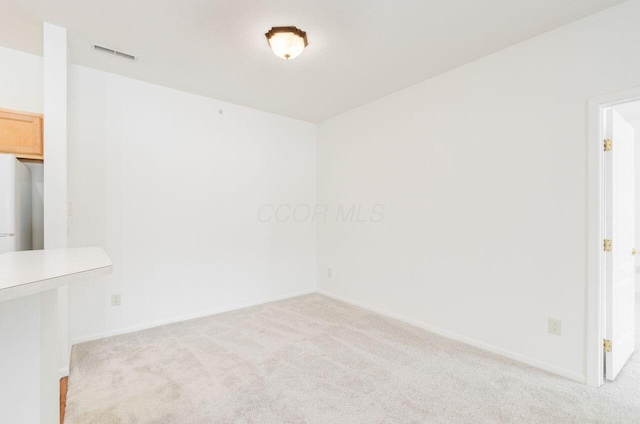 empty room with light carpet