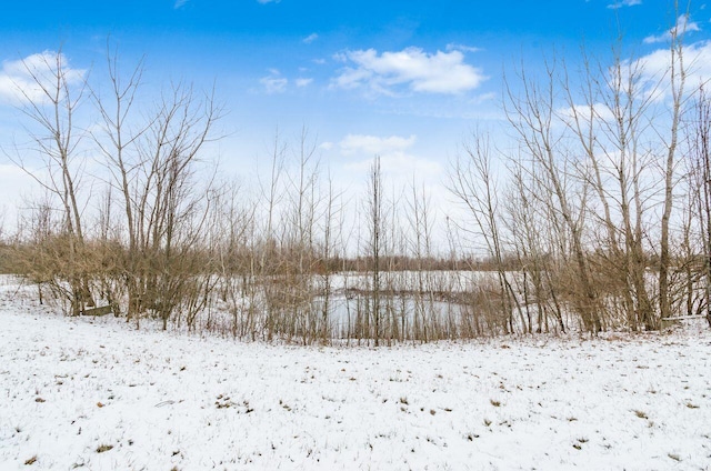 view of snow covered land