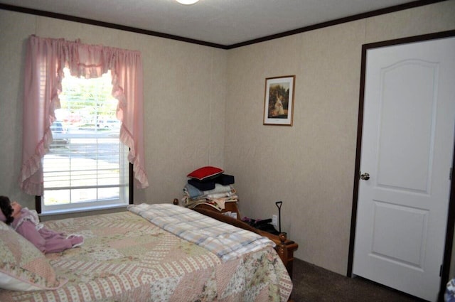 bedroom with carpet and ornamental molding